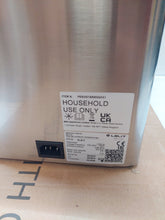 Load image into Gallery viewer, Back view of Lelit Victoria PL91T espresso machine showing power input and safety labels on stainless steel body
