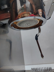 Close-up of steam wand and portafilter of Lelit Victoria PL91T espresso machine with stainless steel finish